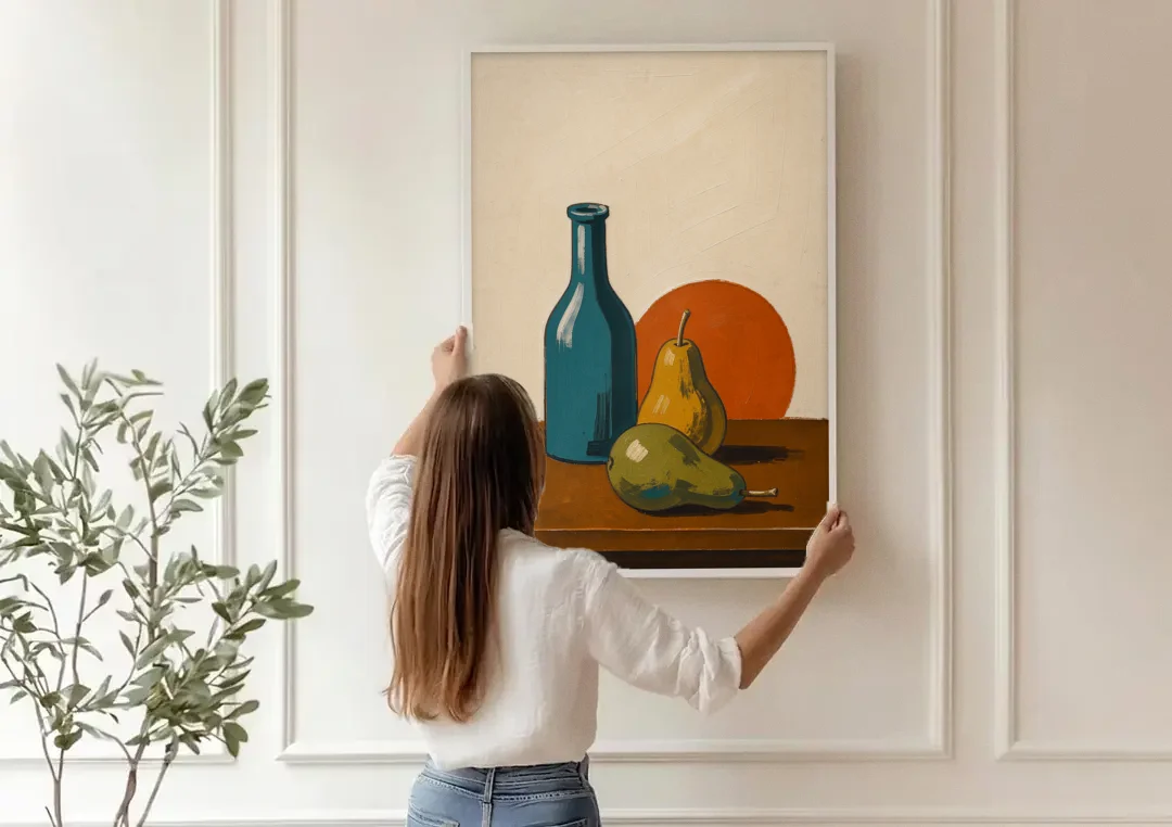 Two Pears Beside a Teal Glass Bottle canvas wall art being hung on a paneled wall