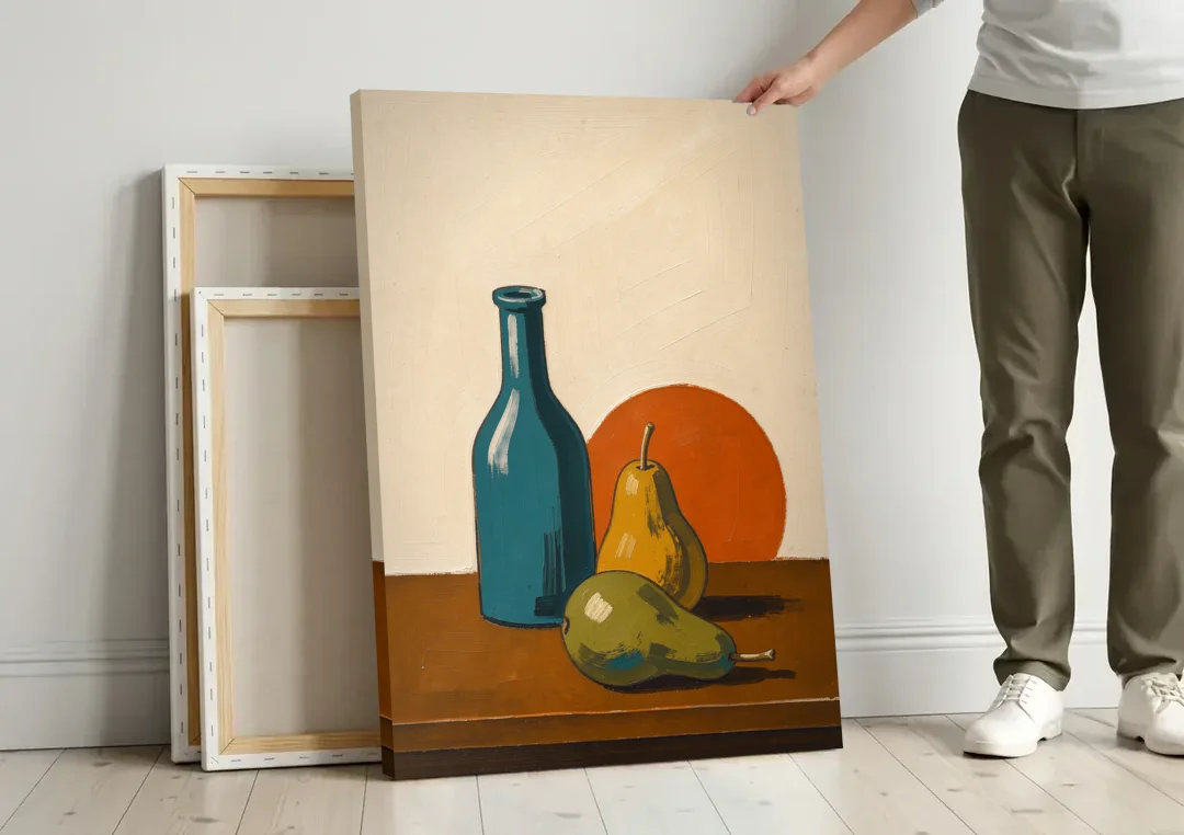 Two Pears Beside a Teal Glass Bottle canvas wall art leaning against a wall next to blank canvases
