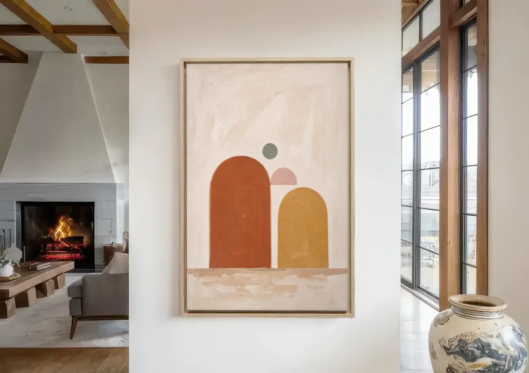 Two Uneven Arches with a Pink Half Sun canvas wall art in a living room with a fireplace