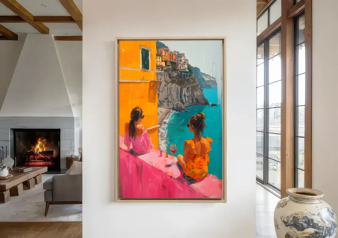 Two Women Painting by the Sea canvas wall art in a living room with a fireplace