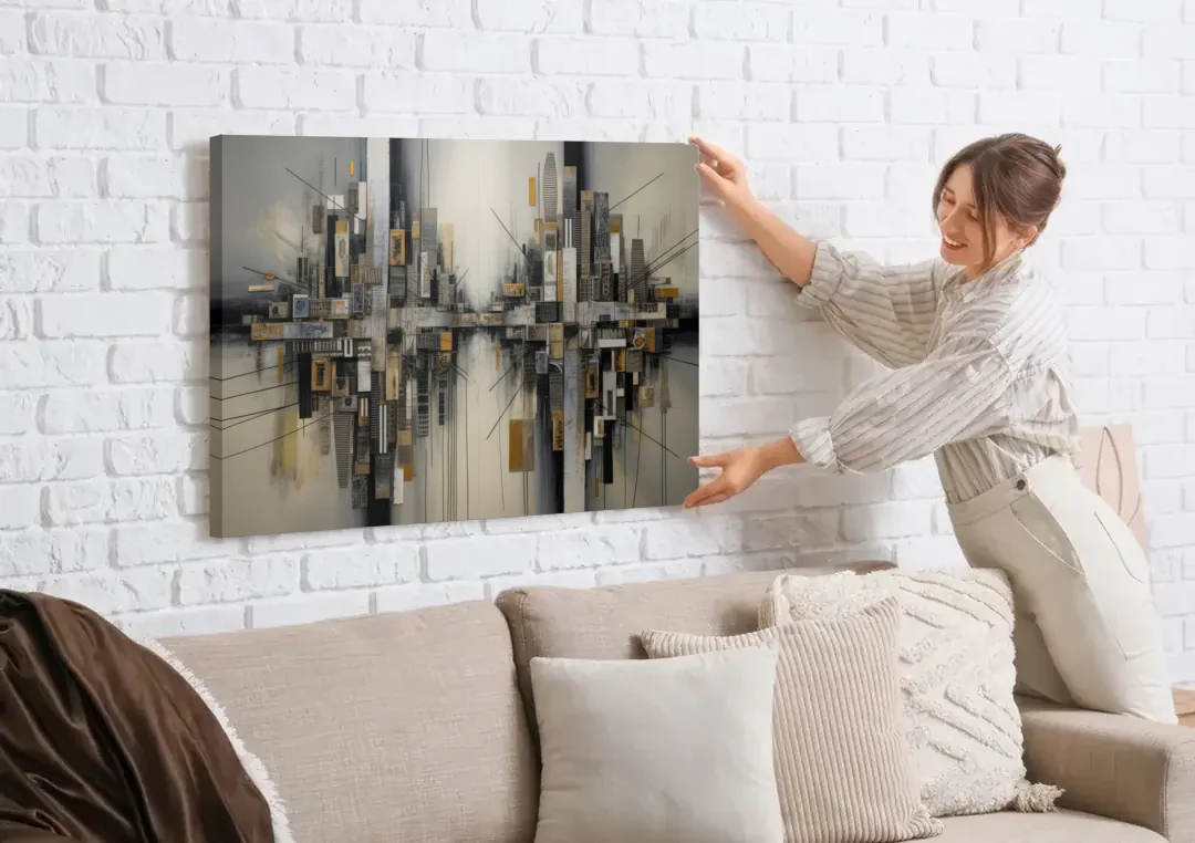 Urban Layers Grey Abstract canvas wall art being hung on a white brick wall above a sofa