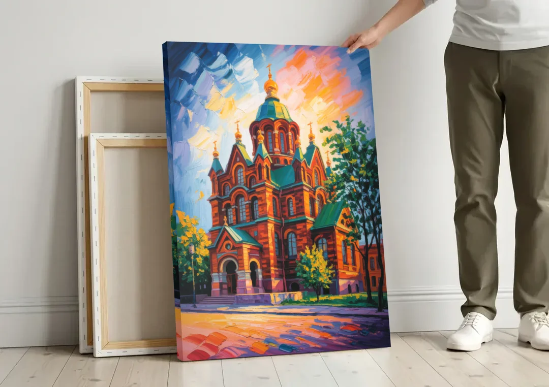 Uspenski Cathedral Charm canvas wall art leaning against a wall next to blank canvases