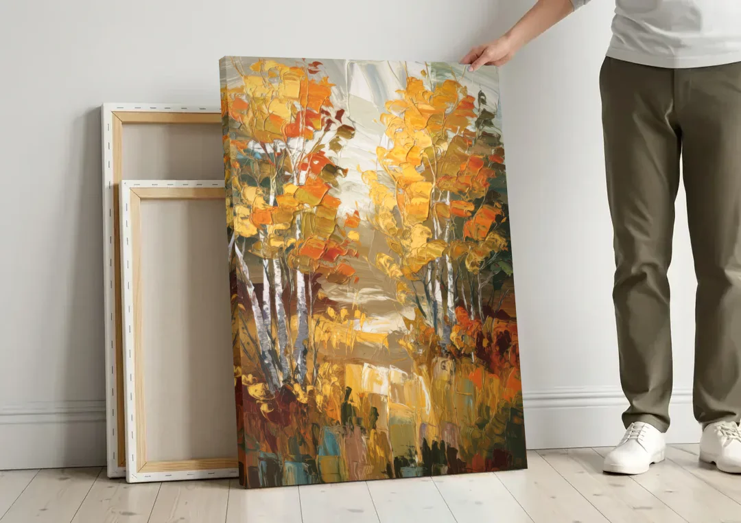 Vail Aspen Forest canvas wall art leaning against a wall next to blank canvases