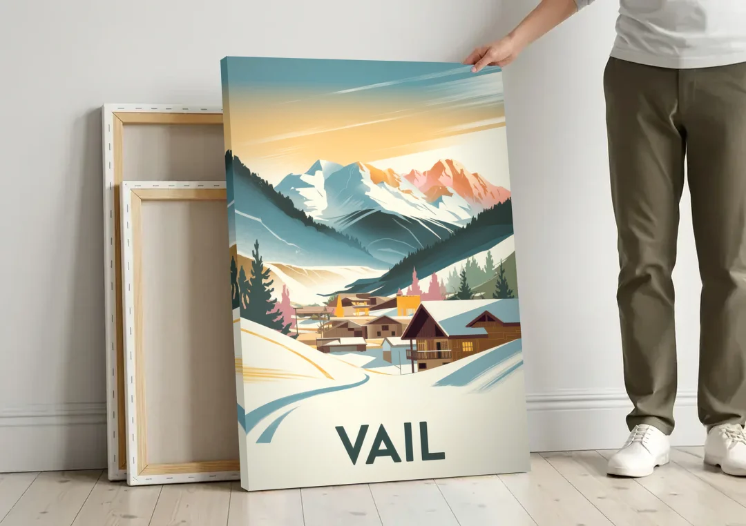 Vail Colorado Charm canvas wall art leaning against a wall next to blank canvases