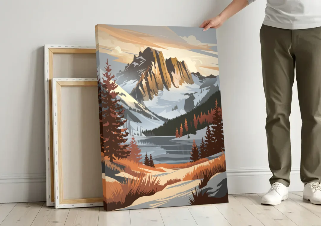 Vail Snowy Peaks canvas wall art leaning against a wall next to blank canvases