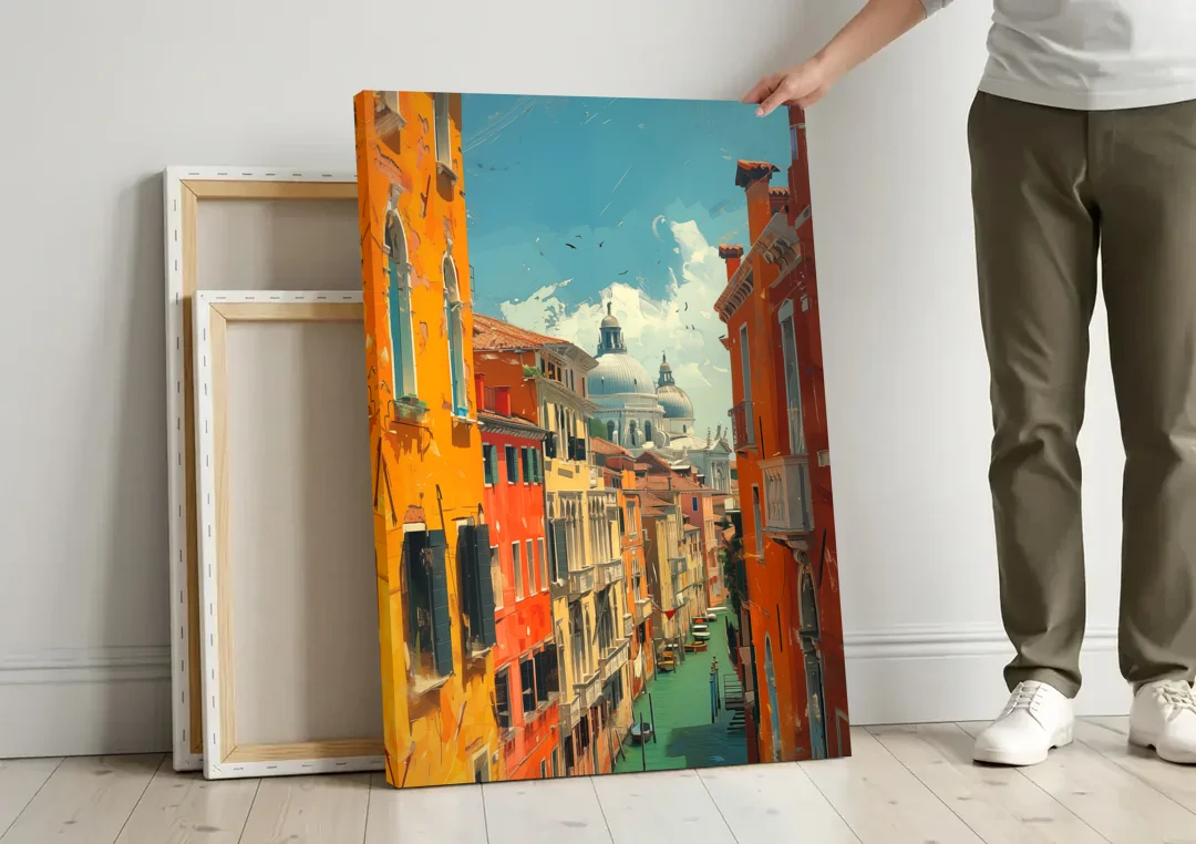Venice Canal Painting with a Distant Dome canvas wall art leaning against a wall next to blank canvases