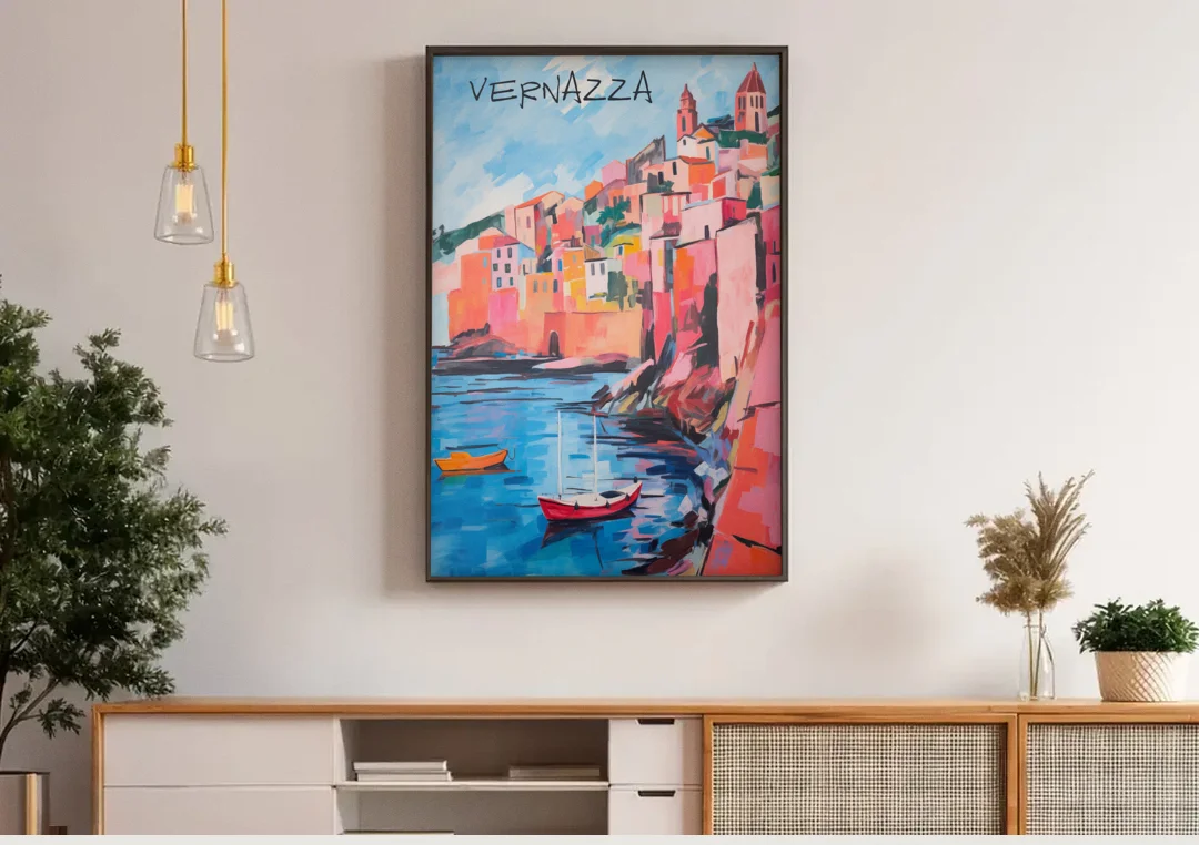 Vernazza Painting with Red Boats canvas wall art above a wooden sideboard under pendant lights