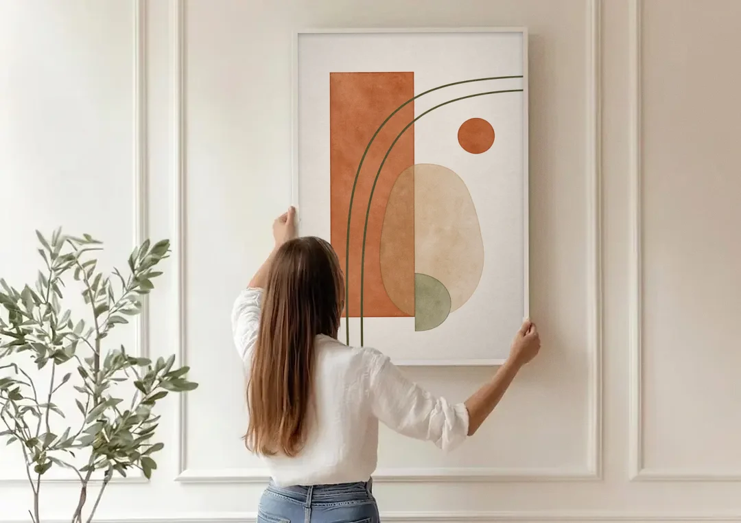 Vertical Abstract Wall Art with Olive Arcs canvas wall art being hung on a paneled wall