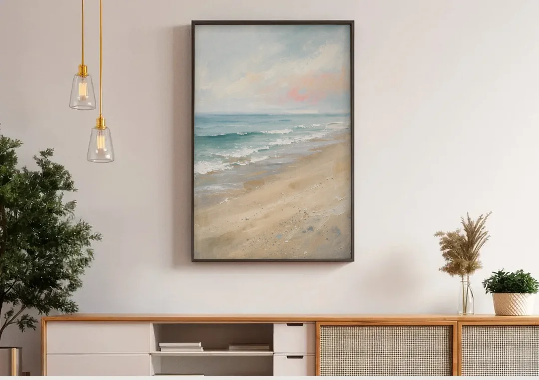 Vertical Beach Wall Art of a Dissolving Shore canvas wall art above a wooden sideboard under pendant lights