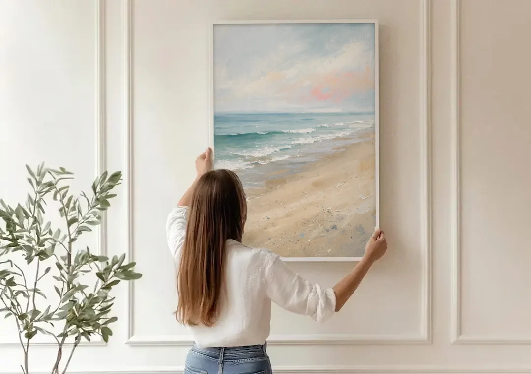 Vertical Beach Wall Art of a Dissolving Shore canvas wall art being hung on a paneled wall