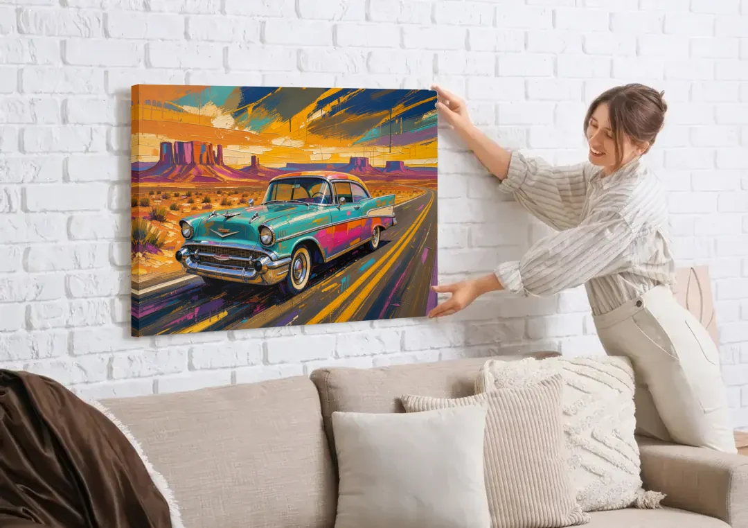 Vintage Car Wall Art Turquoise Sedan on Desert Road canvas wall art being hung on a white brick wall above a sofa