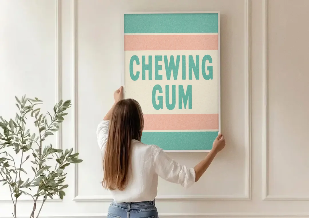 Vintage Chewing Gum canvas wall art being hung on a paneled wall