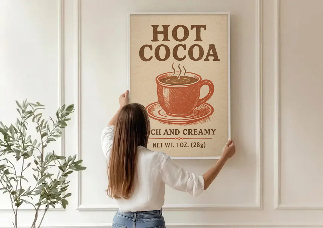 Vintage Creamy Hot Cocoa canvas wall art being hung on a paneled wall
