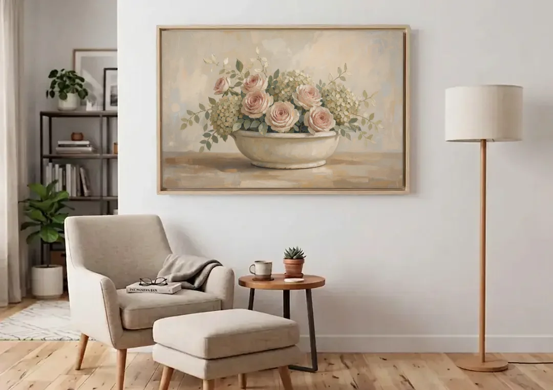 Vintage Flower Wall Art of Roses and Hydrangea canvas wall art above an armchair in a bright living room