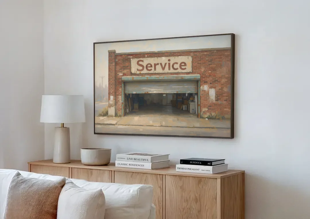 Vintage Garage Signs Service Over the Open Bay canvas wall art above a wooden sideboard next to a sofa