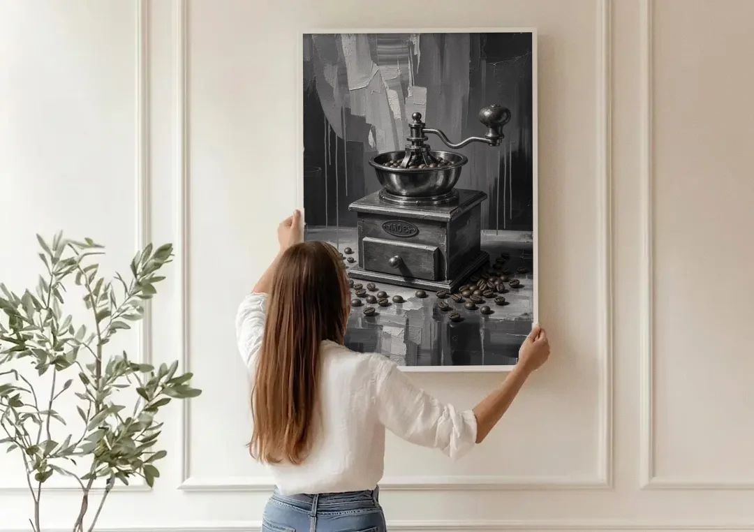 Vintage Hand-Crank Coffee Grinder for the Kitchen canvas wall art being hung on a paneled wall