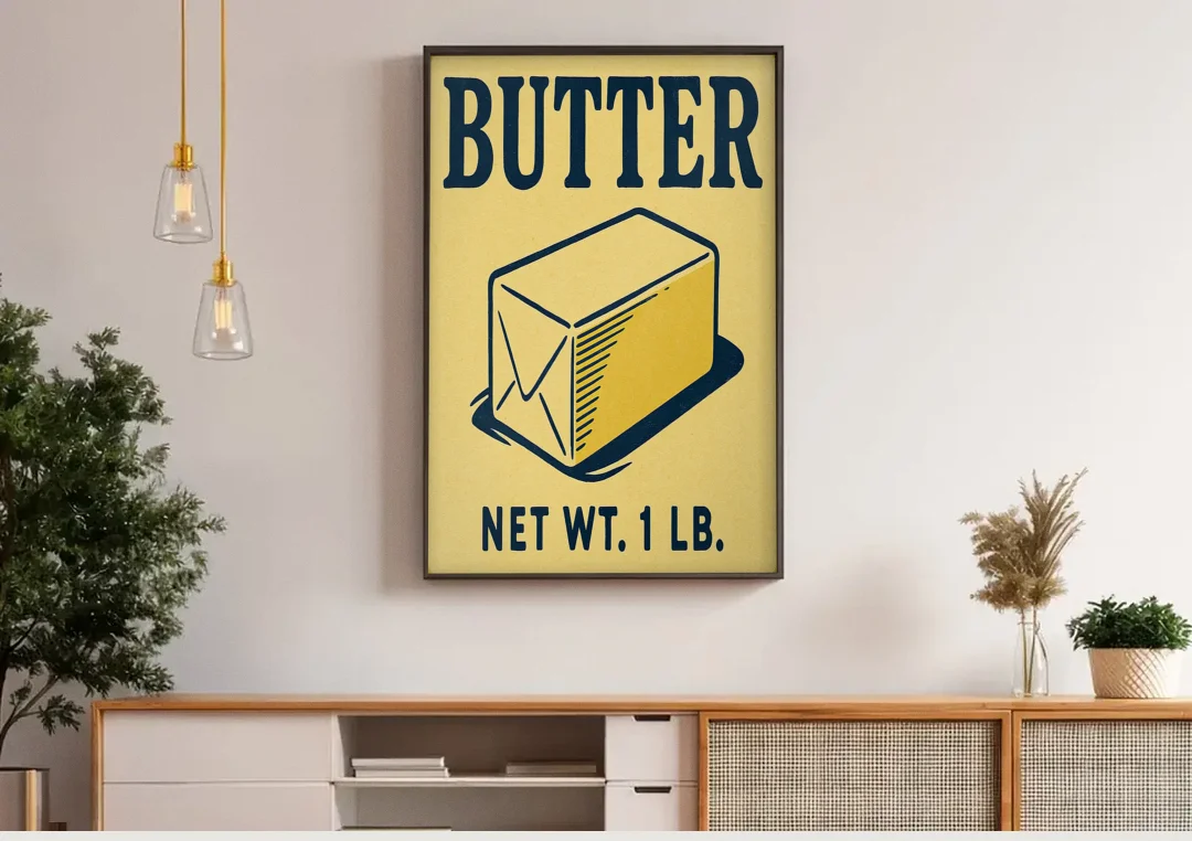 Vintage Natural Butter canvas wall art above a wooden sideboard under pendant lights