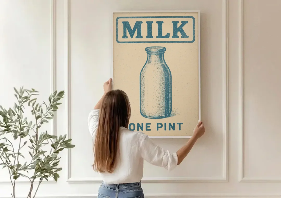 Vintage One Pint of Milk canvas wall art being hung on a paneled wall