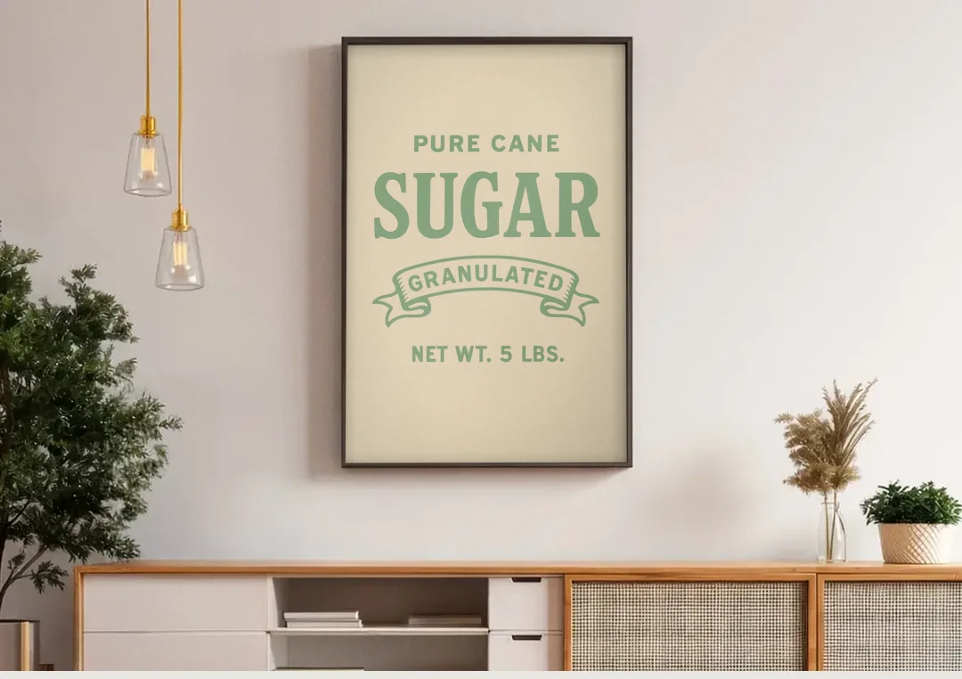 Vintage Pure Cane Sugar canvas wall art above a wooden sideboard under pendant lights