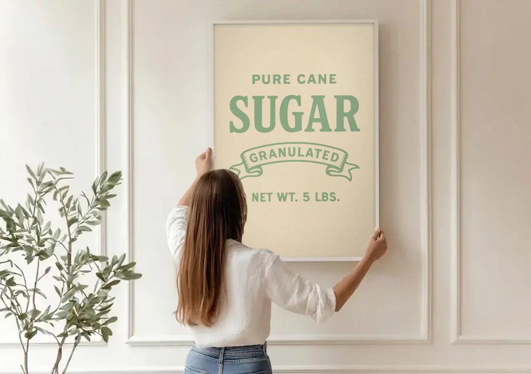 Vintage Pure Cane Sugar canvas wall art being hung on a paneled wall