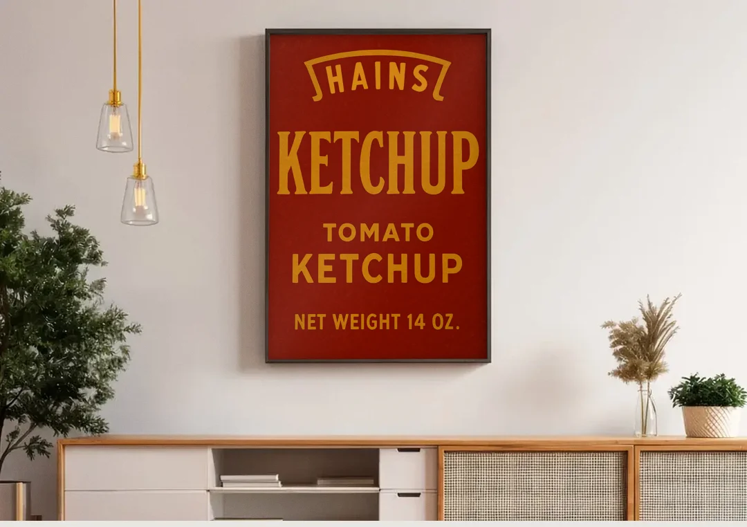 Vintages Hains Tomato Ketchup canvas wall art above a wooden sideboard under pendant lights