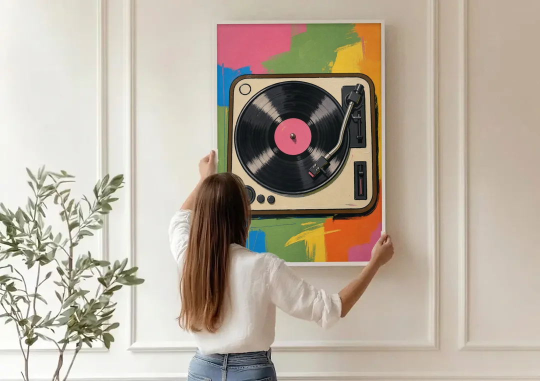 Vinyl Record Wall Art of a Turntable From Above canvas wall art being hung on a paneled wall