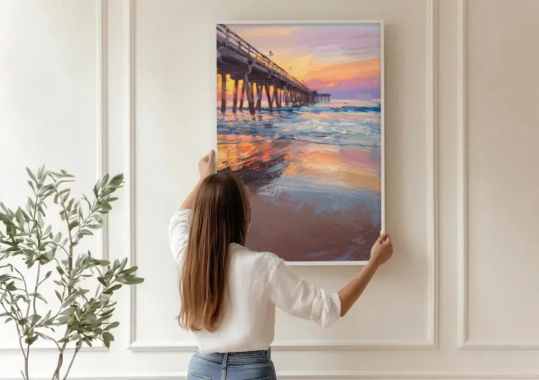 Virginia Beach Pier at Sunset canvas wall art being hung on a paneled wall
