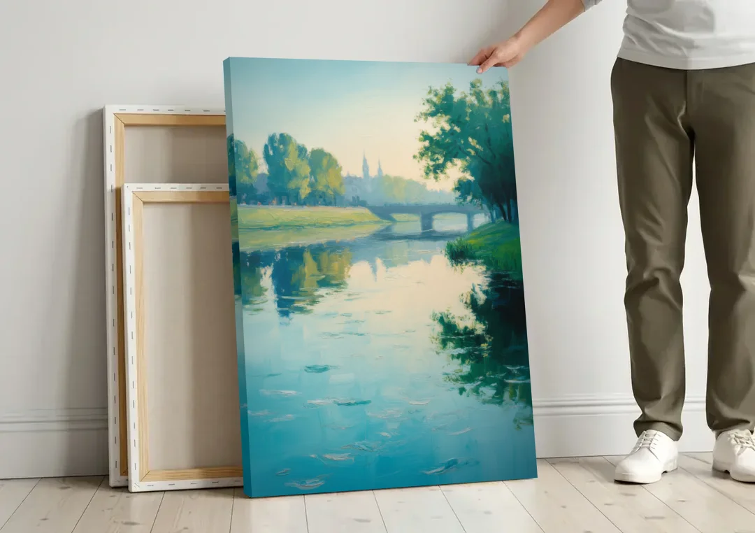 Vistula River Serenity canvas wall art leaning against a wall next to blank canvases