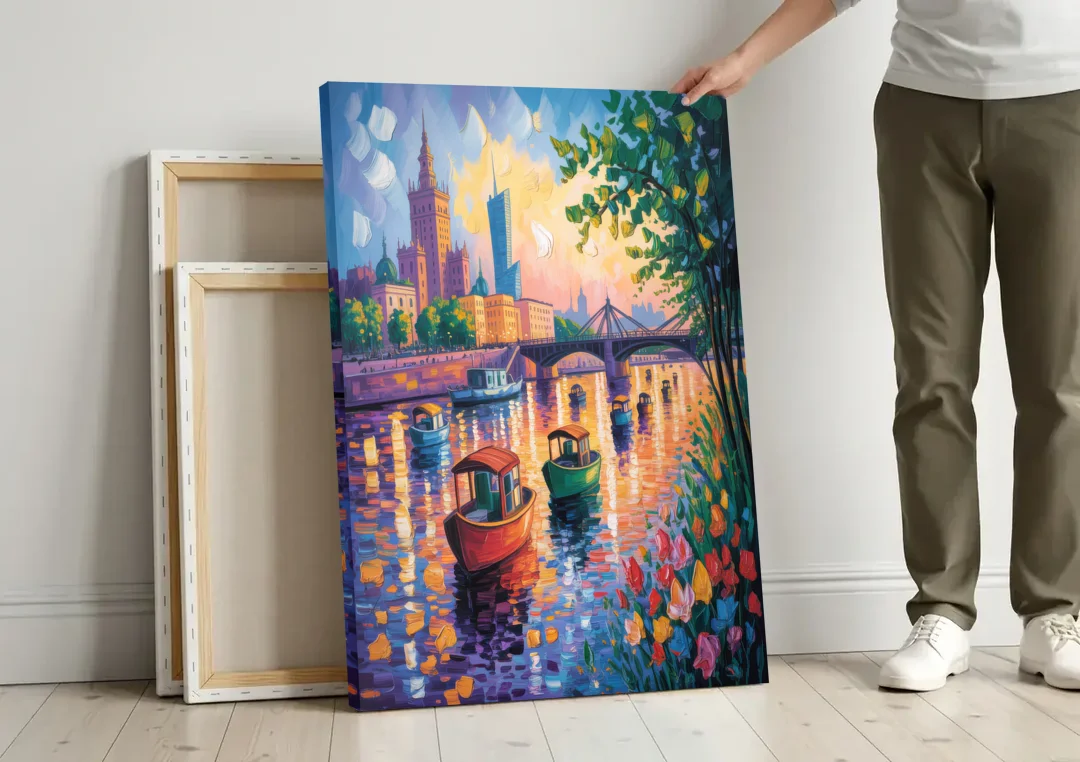 Vistula River View canvas wall art leaning against a wall next to blank canvases