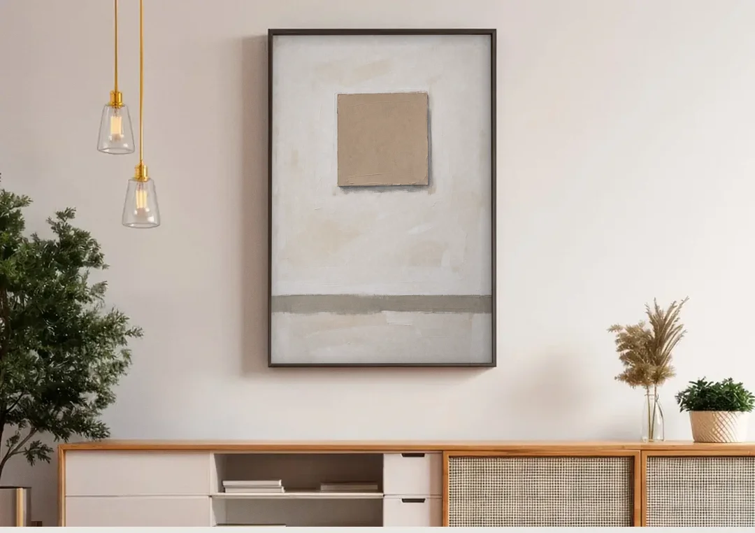 Warm Neutral Wall Art with a Floating Clay Square canvas wall art above a wooden sideboard under pendant lights