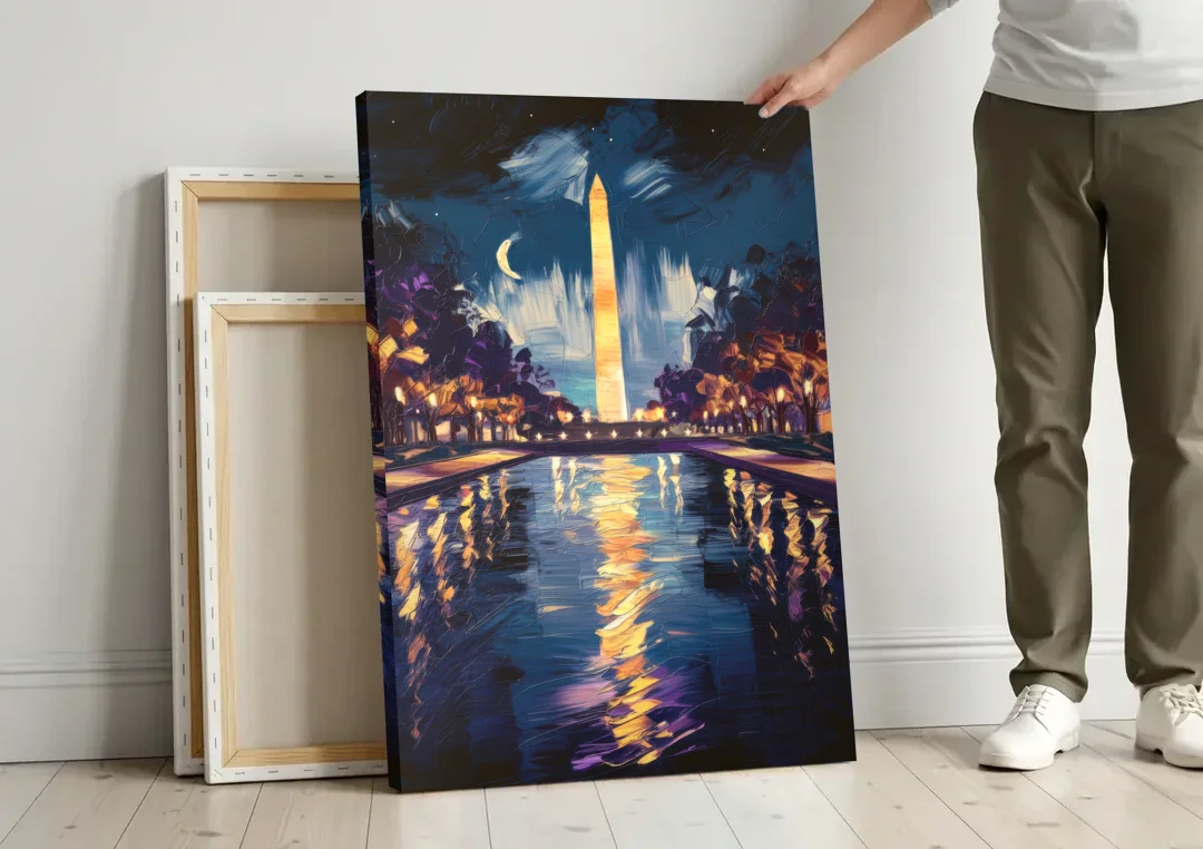 Washington DC Night Lights canvas wall art leaning against a wall next to blank canvases