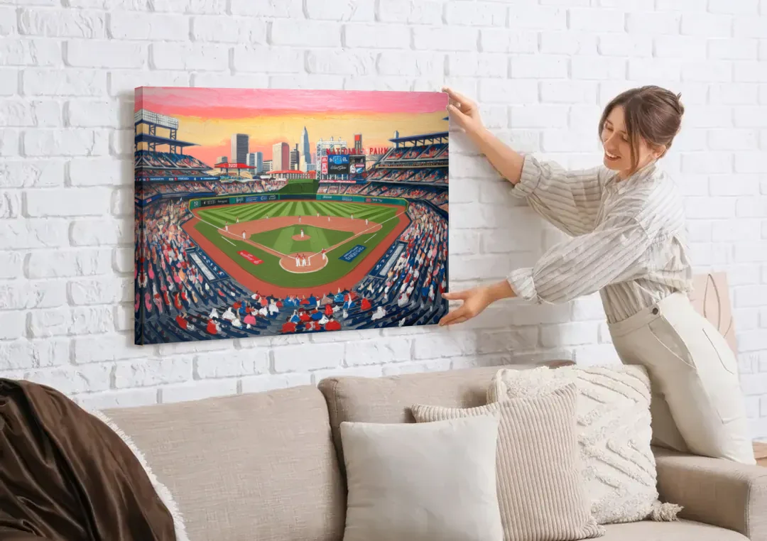 Washington Nationals Baseball canvas wall art being hung on a white brick wall above a sofa