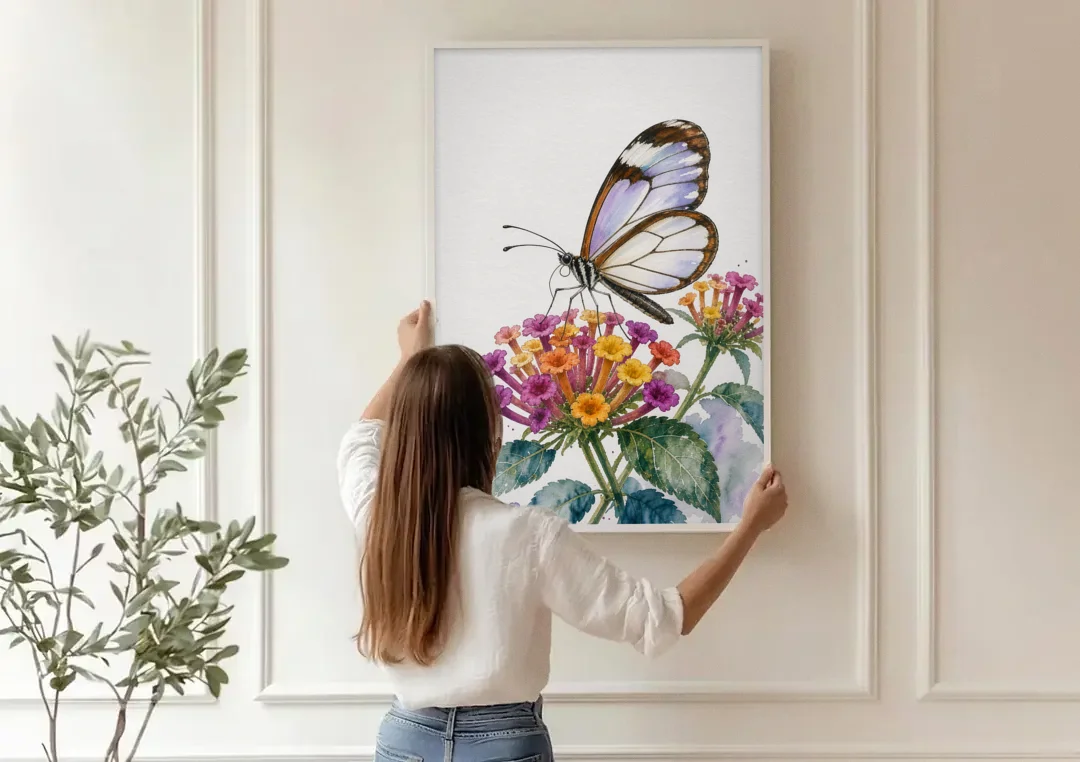 Watercolor Butterfly Painting of a Glasswing on Lantana canvas wall art being hung on a paneled wall