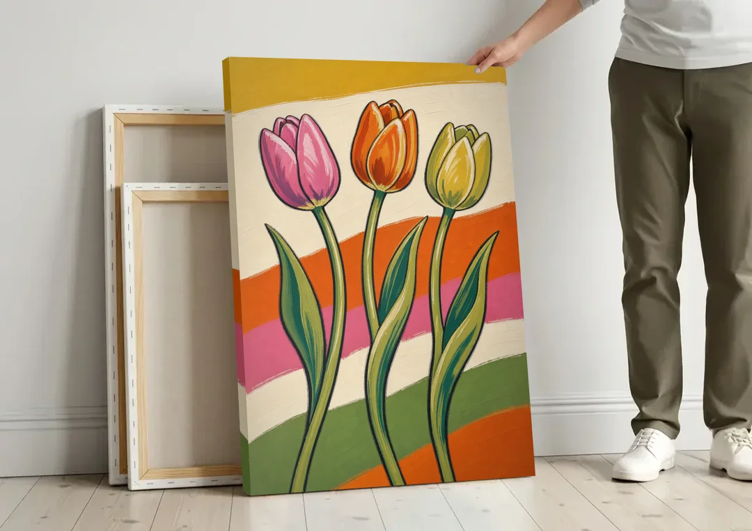 Wavy Retro Dancing Tulip Trio canvas wall art leaning against a wall next to blank canvases