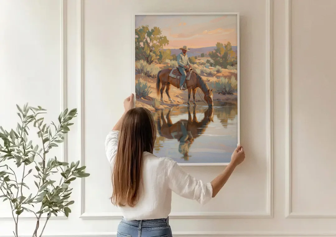 Western Wall Art for Bedroom Rider at the Creek canvas wall art being hung on a paneled wall