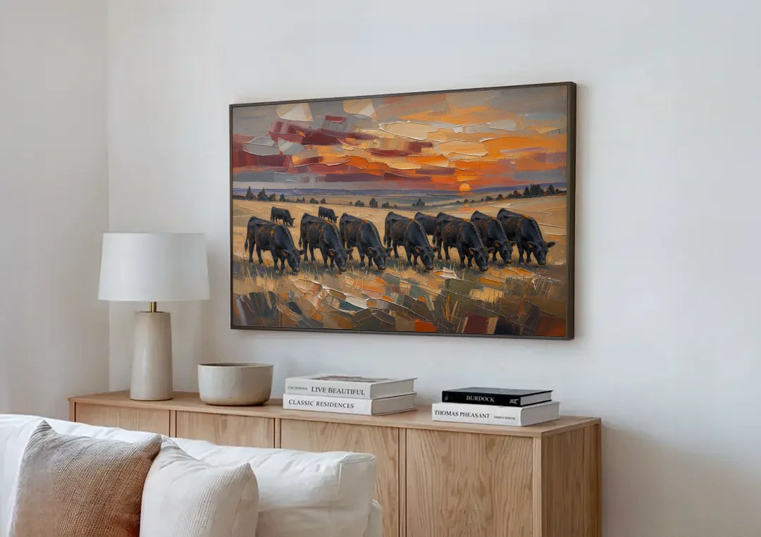 Western Wall Art of Angus Grazing at Sundown canvas wall art above a wooden sideboard next to a sofa