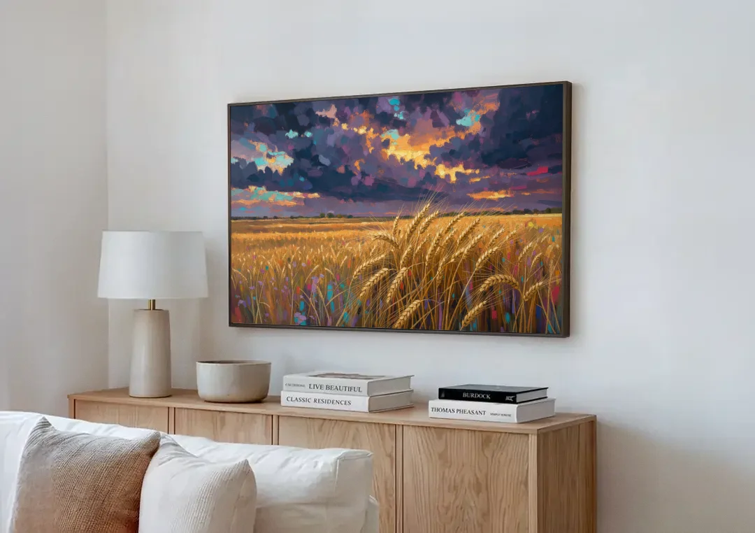 Wheat Field Painting Under a Gathering Storm canvas wall art above a wooden sideboard next to a sofa