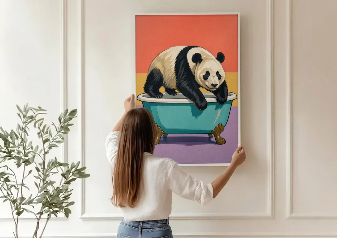Whimsical Bathroom Wall Art of a Lounging Panda canvas wall art being hung on a paneled wall