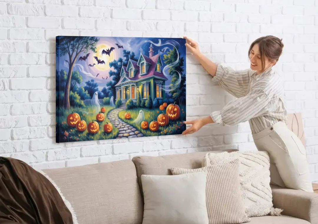 Whimsical Enchantment Victorian Halloween canvas wall art being hung on a white brick wall above a sofa