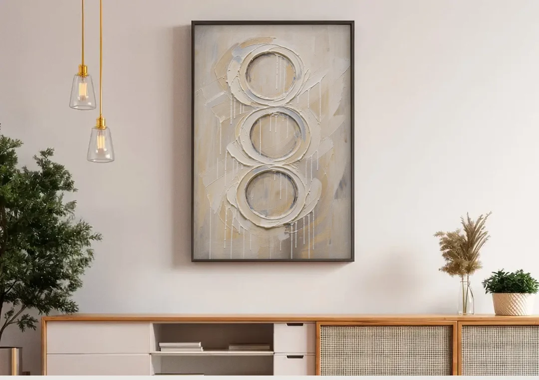 White Abstract Wall Art with Three Stacked Rings canvas wall art above a wooden sideboard under pendant lights