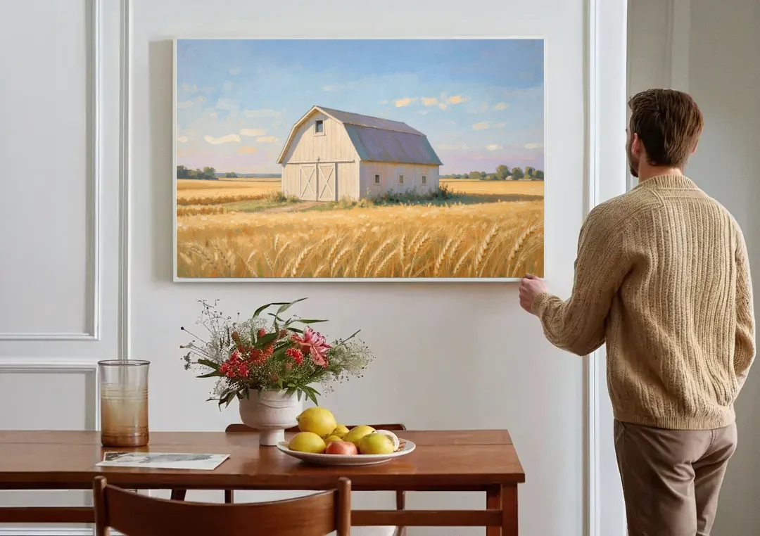 White Barn Beyond the Golden Wheat canvas wall art above a dining table