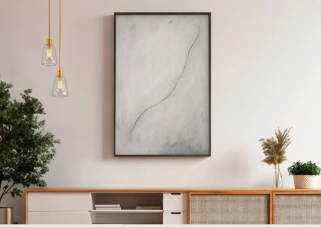 White Minimalist Wall Art with a Falling Charcoal Thread canvas wall art above a wooden sideboard under pendant lights