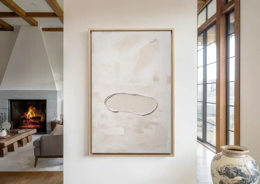 White Plaster Stone Outline on Ivory canvas wall art in a living room with a fireplace