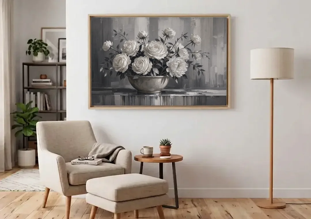 White Roses and Peonies in a Stoneware Bowl canvas wall art above an armchair in a bright living room