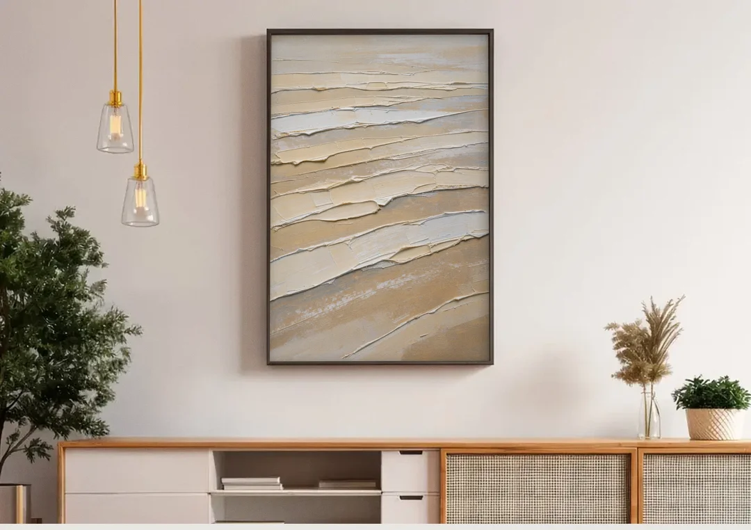 White Textured Painting of Low Tide Ridges canvas wall art above a wooden sideboard under pendant lights