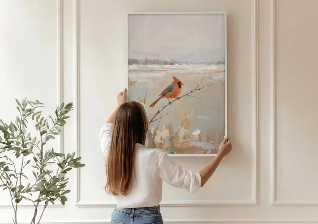 Neutral Christmas Willow Twig Cardinal canvas wall art being hung on a paneled wall