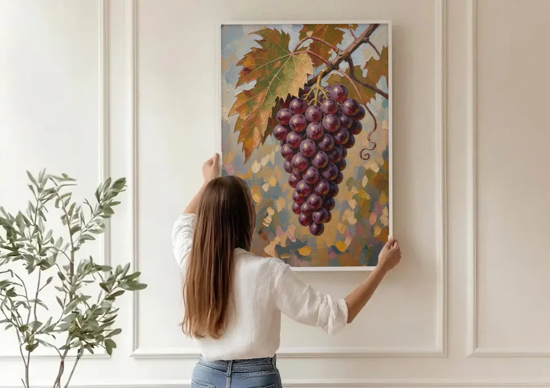 Wine Canvas Art of Ripe Grapes on the Vine canvas wall art being hung on a paneled wall