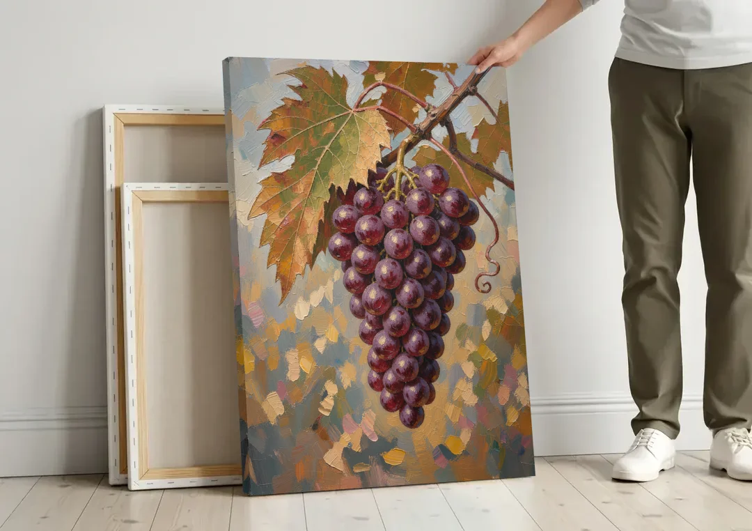 Wine Canvas Art of Ripe Grapes on the Vine canvas wall art leaning against a wall next to blank canvases