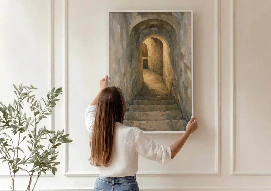 Wine Cellar Decor with Stone Steps to Golden Light canvas wall art being hung on a paneled wall