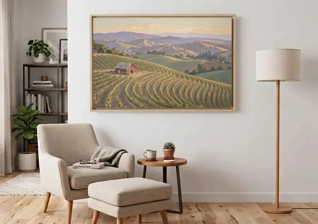 Wine Country Decor with Red Barn on Sonoma Hills canvas wall art above an armchair in a bright living room